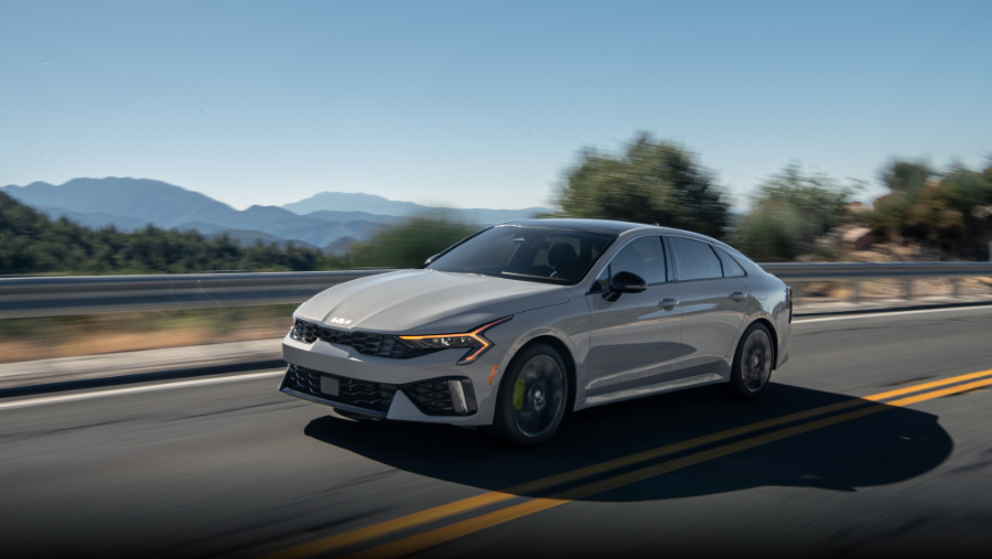 gray sedan vehicle on the road